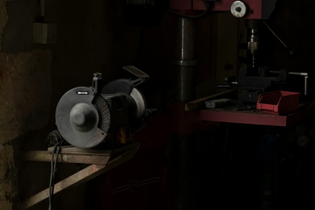 Workbench in a woodturning workshop with warm dramatic lighting